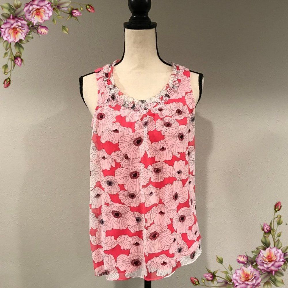 ‎Pink floral sleeveless blouse.